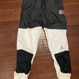 Men’s Large Jordan Black and White Nylon and Polyester Sweat pants!